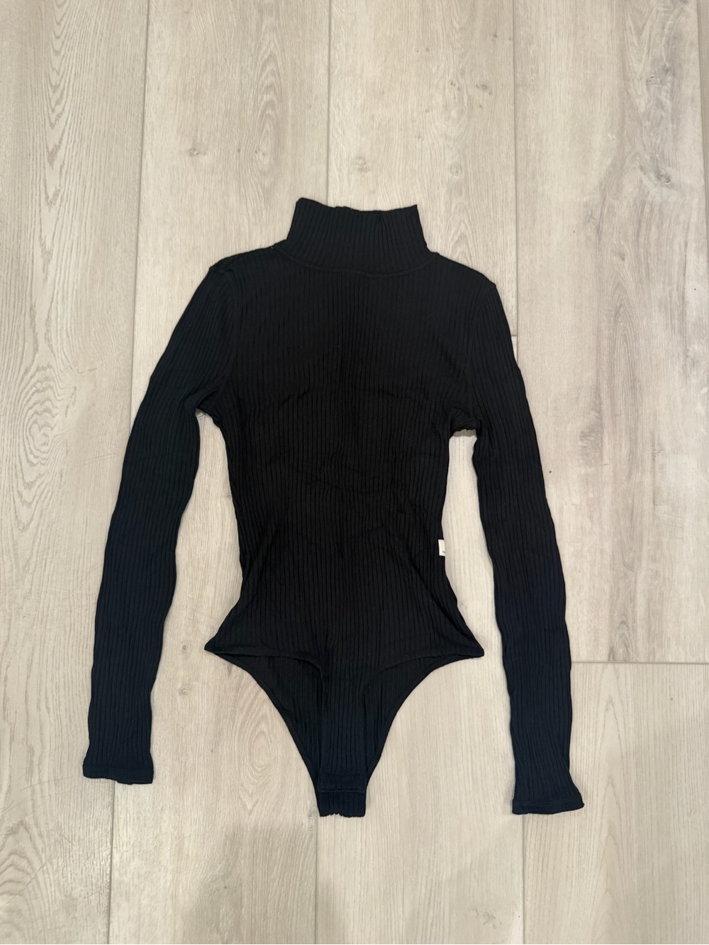 Vuori one piece turtle neck bodysuit in black size small